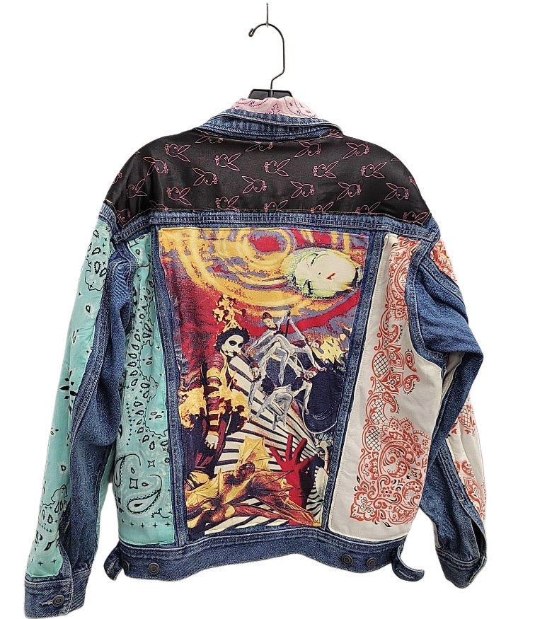 Colorful patchwork jacket with various patterns and designs on a white background